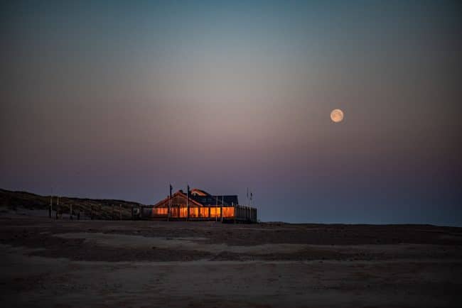 Landschafts Fotografie Strandhaus bei Sonnenuntergang